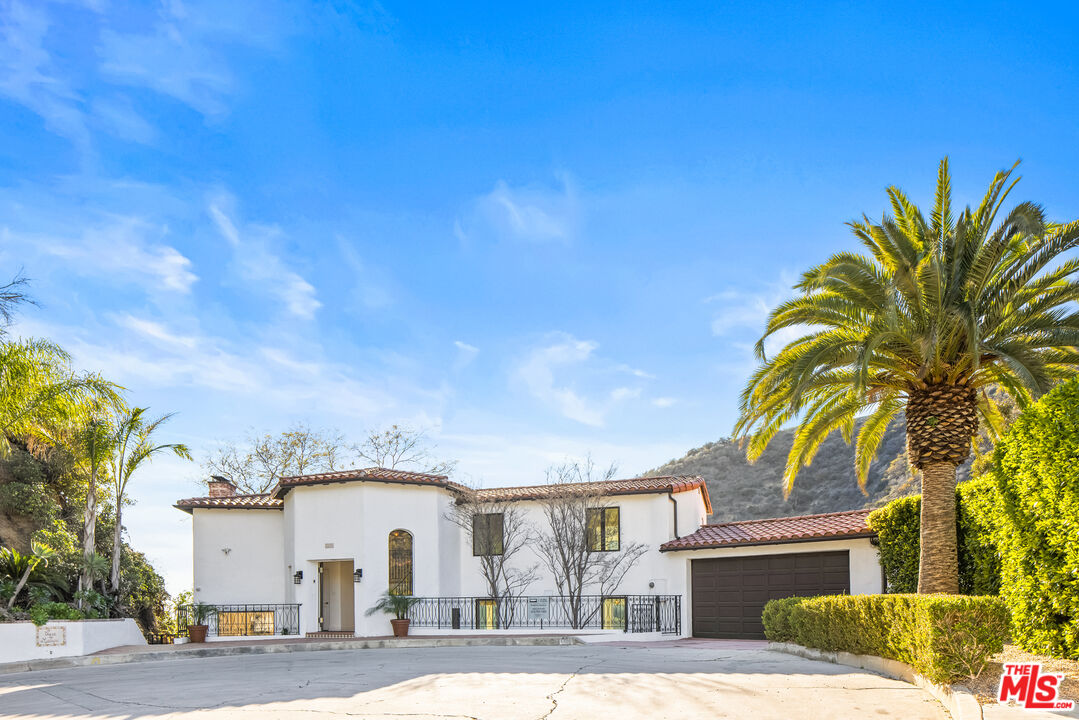 2201 Malaga Road Los Angeles, CA 90068 - Photo 3 of 51 a view of a house with a patio