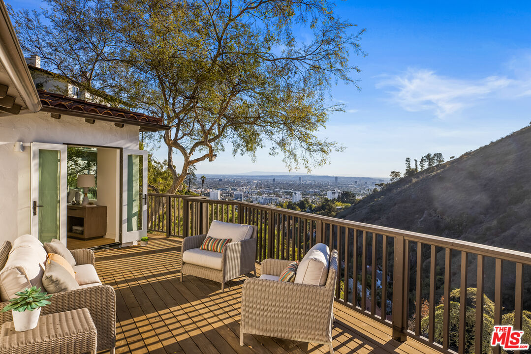 2201 Malaga Road Los Angeles, CA 90068 - Photo 34 of 51 a view of a chair and tables in the balcony