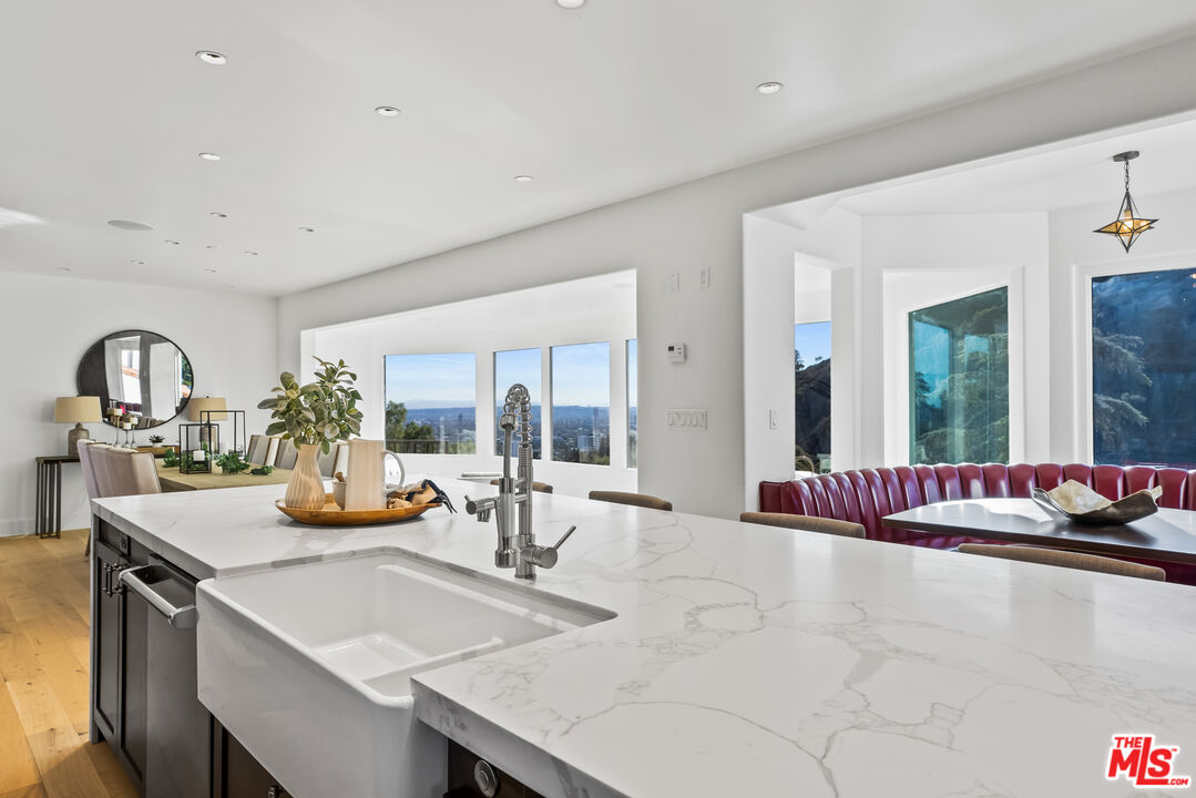 2201 Malaga Road Los Angeles, CA 90068 - Photo 10 of 51 a dining room with a table and chairs