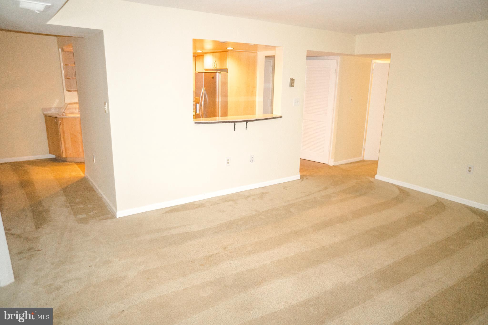 1413 Northgate Square, Unit 1C Reston, VA 20190 - Photo 4 of 16 Huge Living Room Open to Kitchen and Dining Room