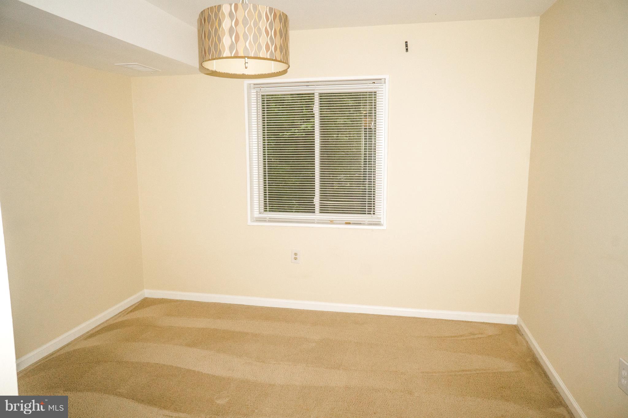 1413 Northgate Square, Unit 1C Reston, VA 20190 - Photo 5 of 16 Dining Room Facing Trees