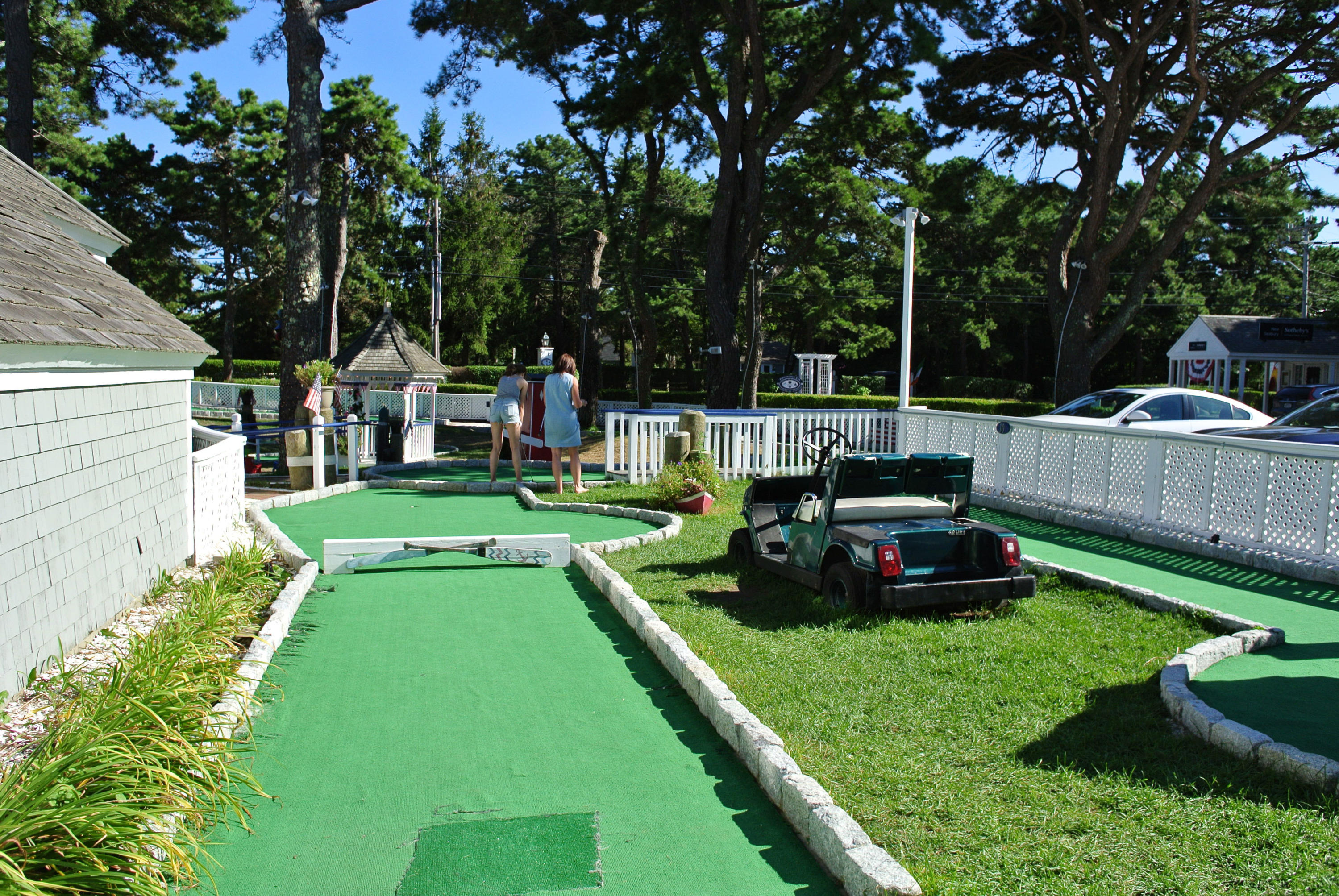 44 Brant Rock Road Mashpee, MA 02649 - Photo 21 of 22 a view of a white house with a big yard plants and large trees