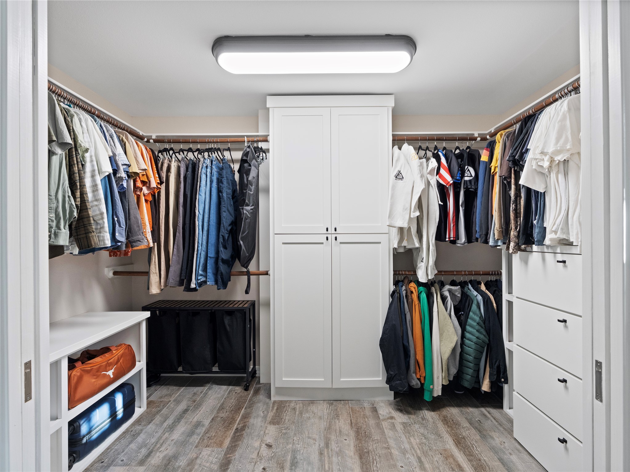5108 Sioux Lane Austin, TX 78734 - Photo 21 of 35 a view of walk in closet with clothes and shoes