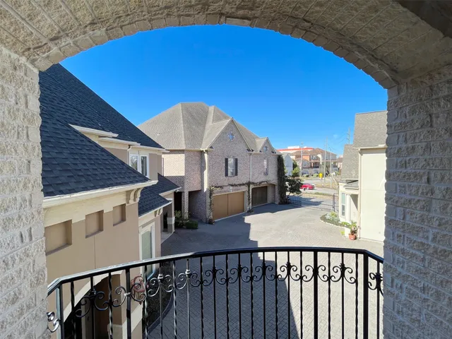 a view of a balcony with an outdoor space