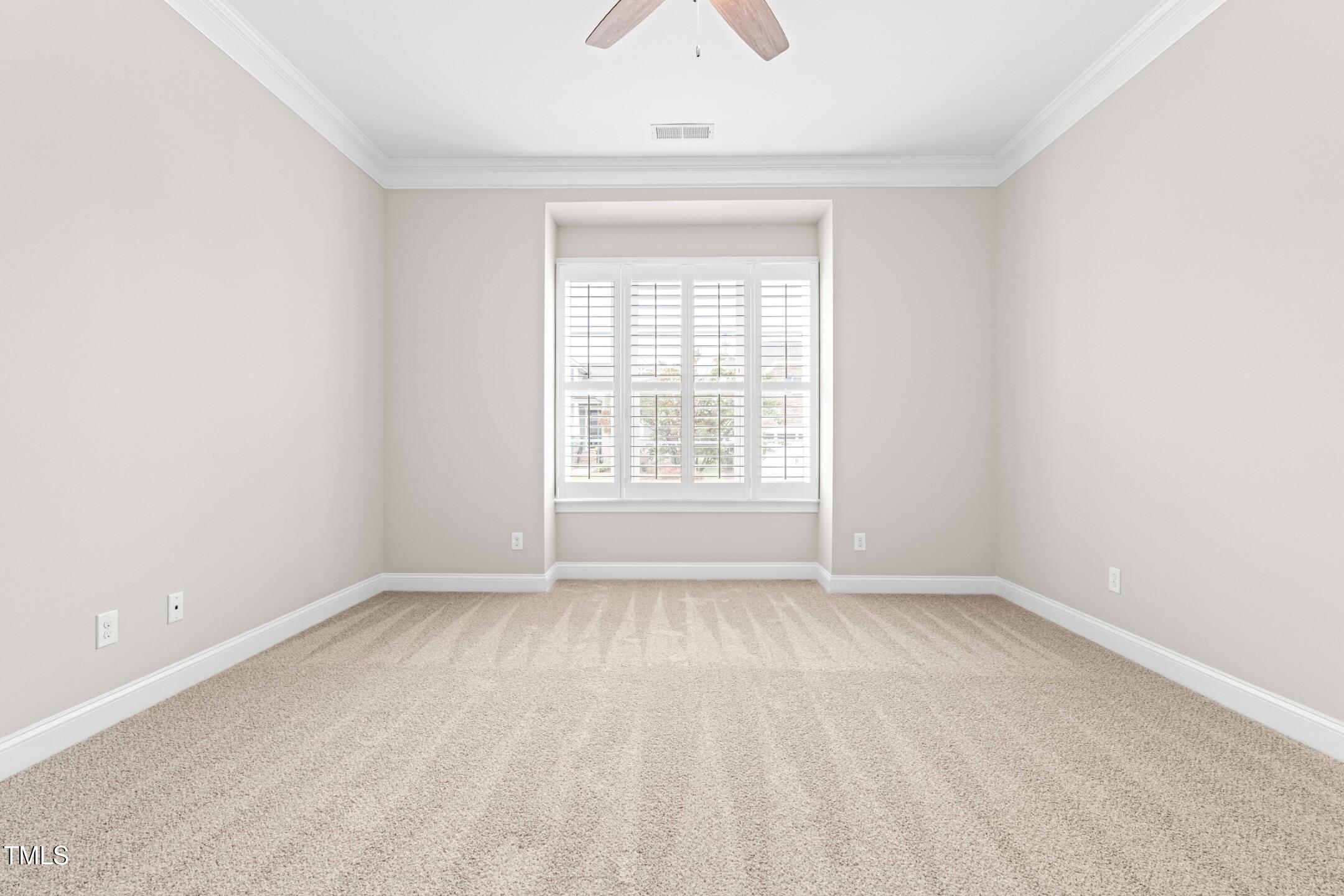 128 Damsire Way Cary, NC 27513 - Photo 31 of 45 an empty room with a window