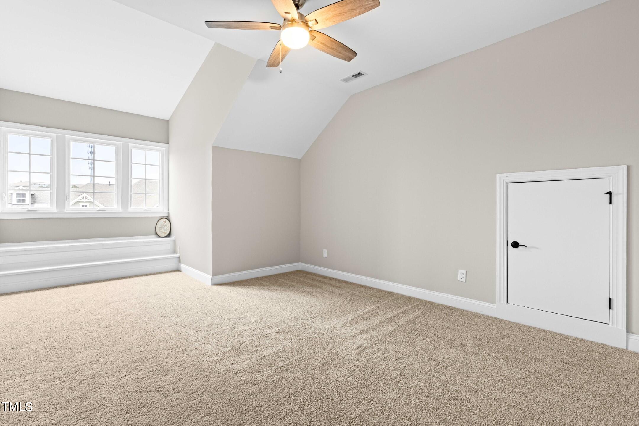 128 Damsire Way Cary, NC 27513 - Photo 39 of 45 a view of an empty room with a window