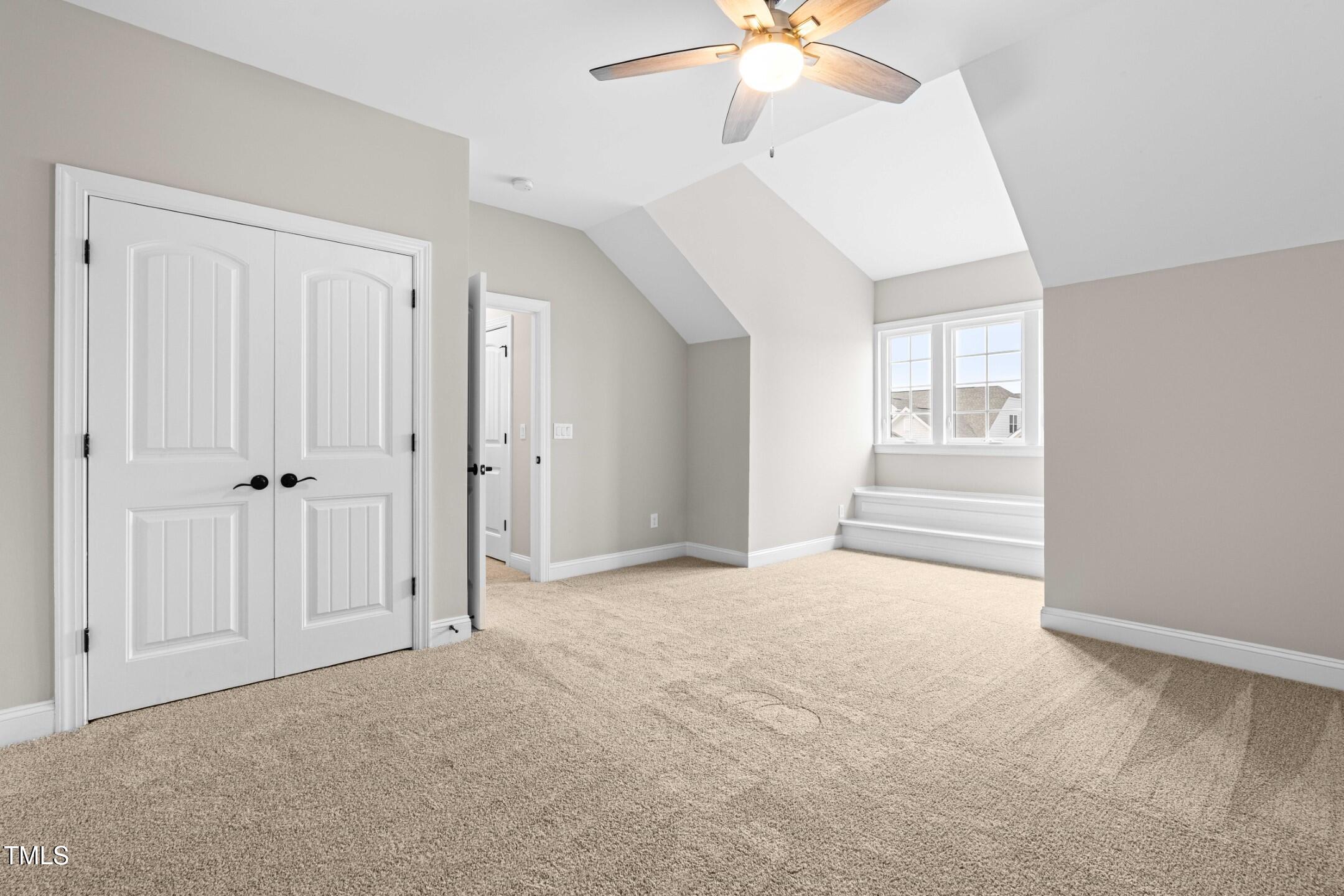 128 Damsire Way Cary, NC 27513 - Photo 40 of 45 a view of an empty room with a chandelier fan