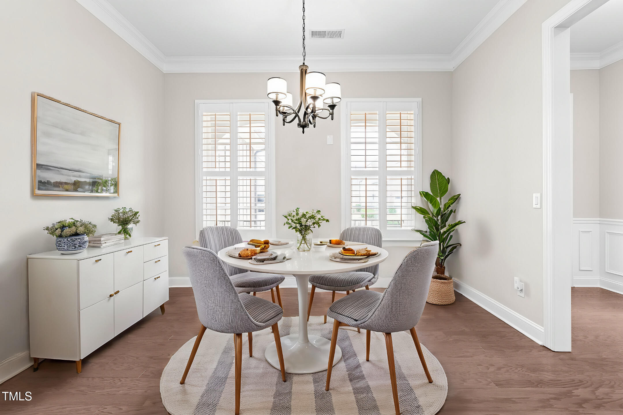 128 Damsire Way Cary, NC 27513 - Photo 4 of 45 a view of a dining room with furniture window and wooden floor