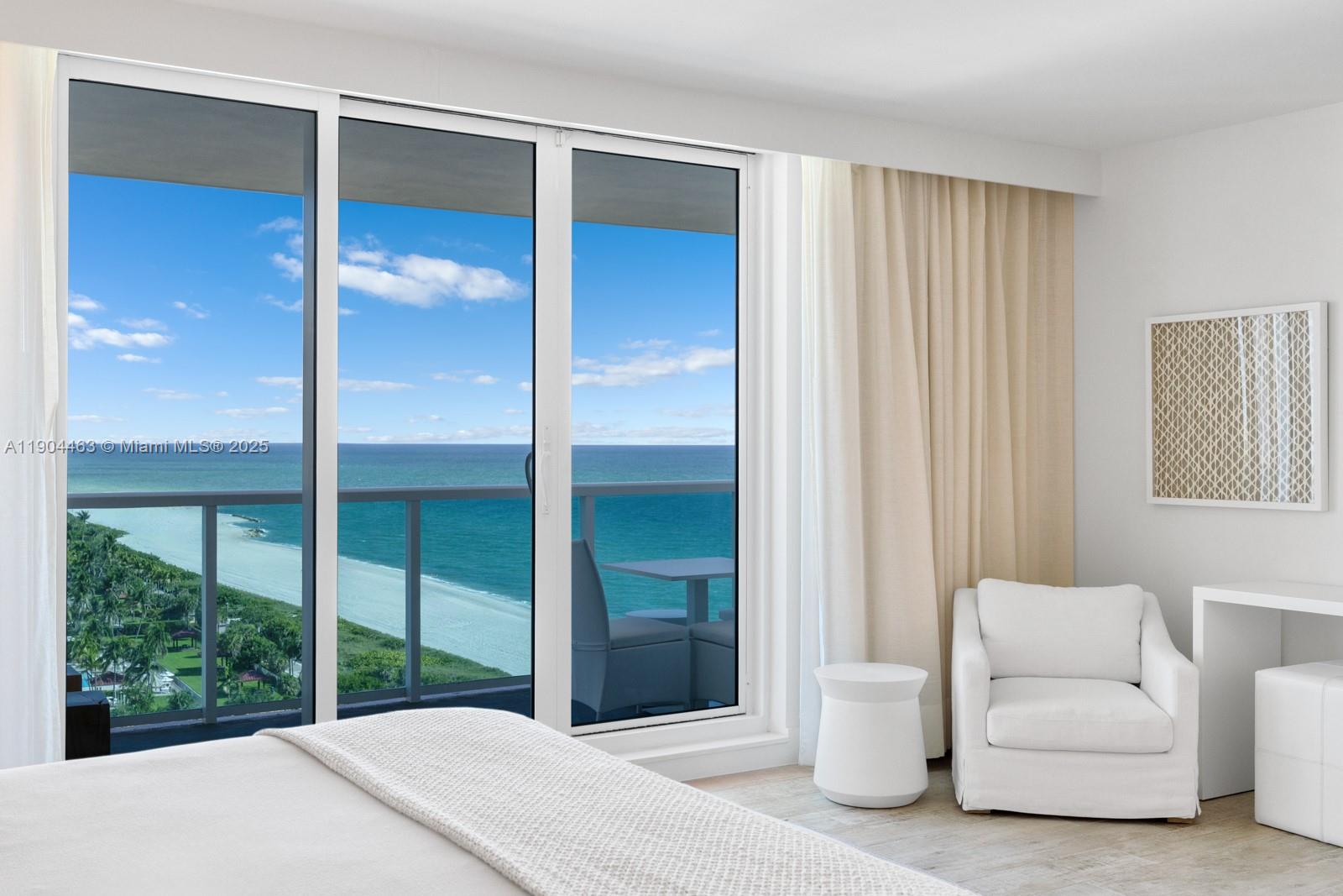 102 24th Street, Unit 1519 Miami Beach, FL 33139 - Photo 17 of 35 a bedroom with a large bed and a large window