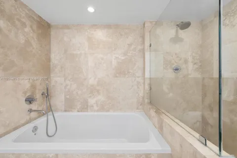 a bathroom with a bath tub