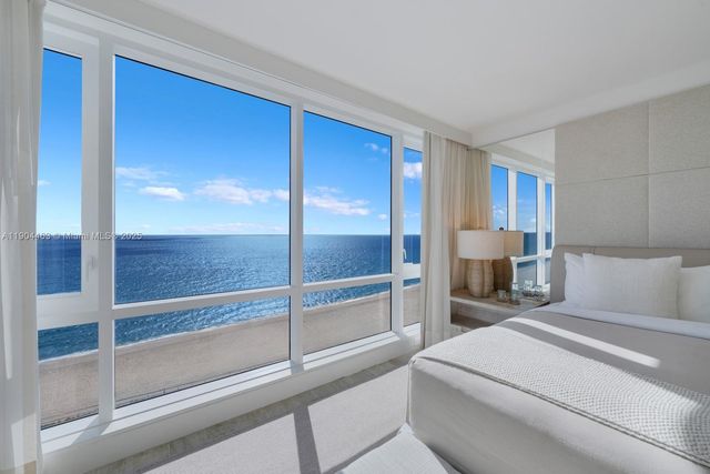 a bedroom with a bed and a walk in closet