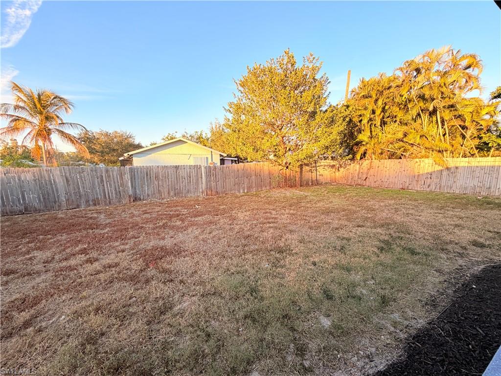 9017 Pineapple Road Fort Myers, FL 33967 - Photo 18 of 24 View of fenced backyard