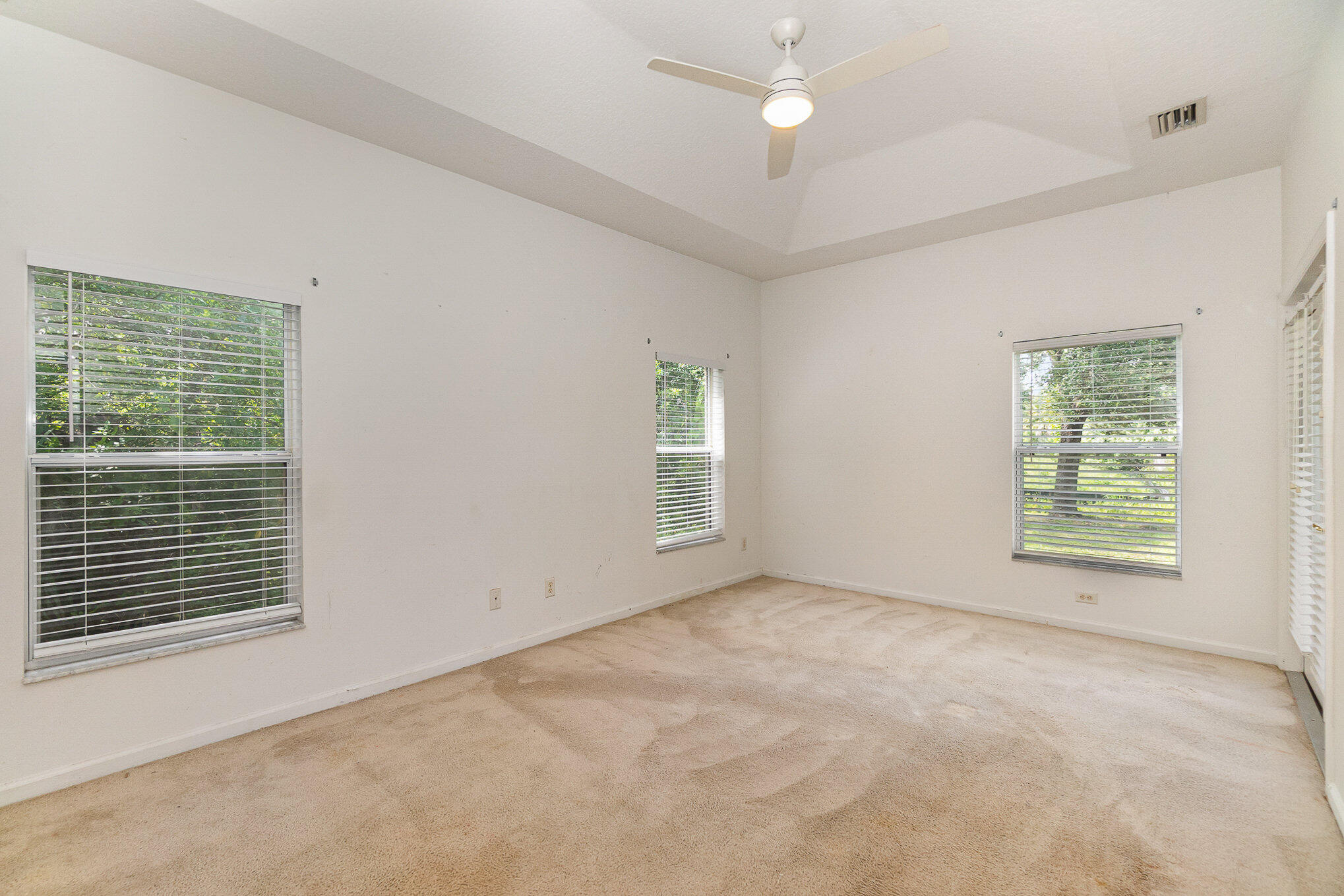 1088 Tupelo Road Southwest Palm Bay, FL 32908 - Photo 13 of 21 a view of an empty room with a window