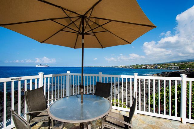 a view of a balcony with a chair