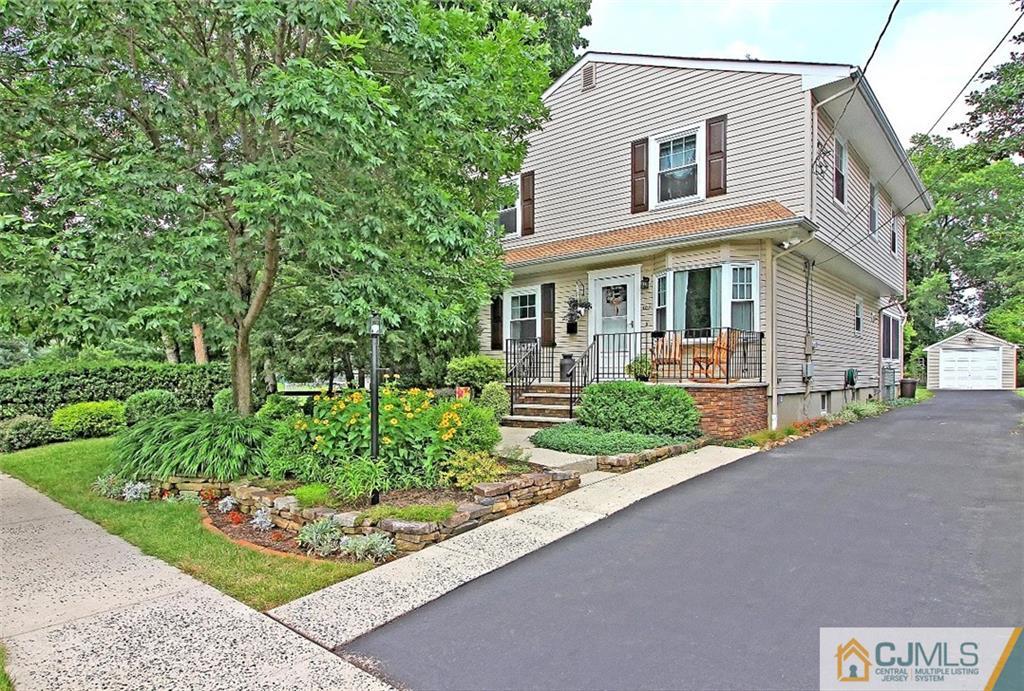 188 Stout Avenue Middlesex, NJ 08846 - Photo 1 of 25 a front view of a house with garden