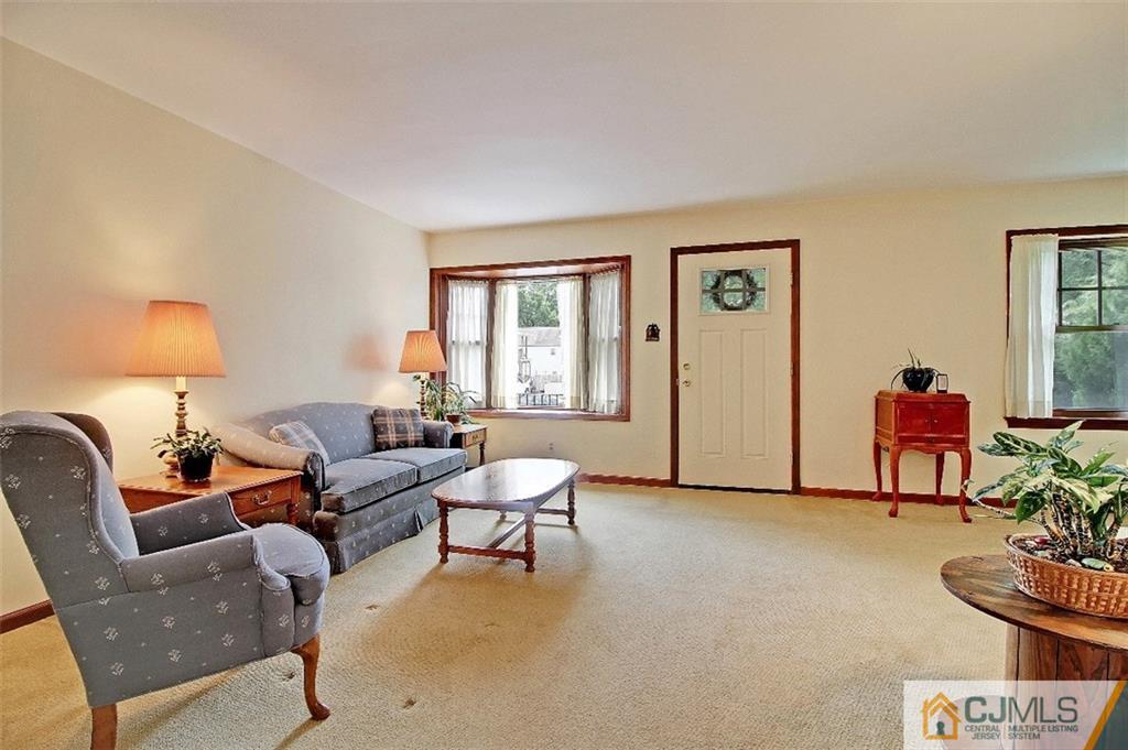 188 Stout Avenue Middlesex, NJ 08846 - Photo 11 of 25 a living room with furniture and a window