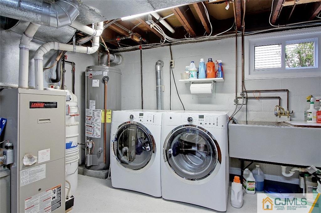 188 Stout Avenue Middlesex, NJ 08846 - Photo 21 of 25 a utility room with dryer and washer