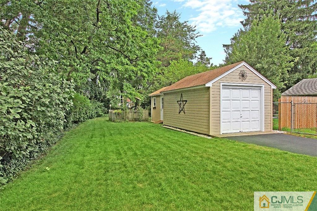 188 Stout Avenue Middlesex, NJ 08846 - Photo 23 of 25 a front view of a house with a yard