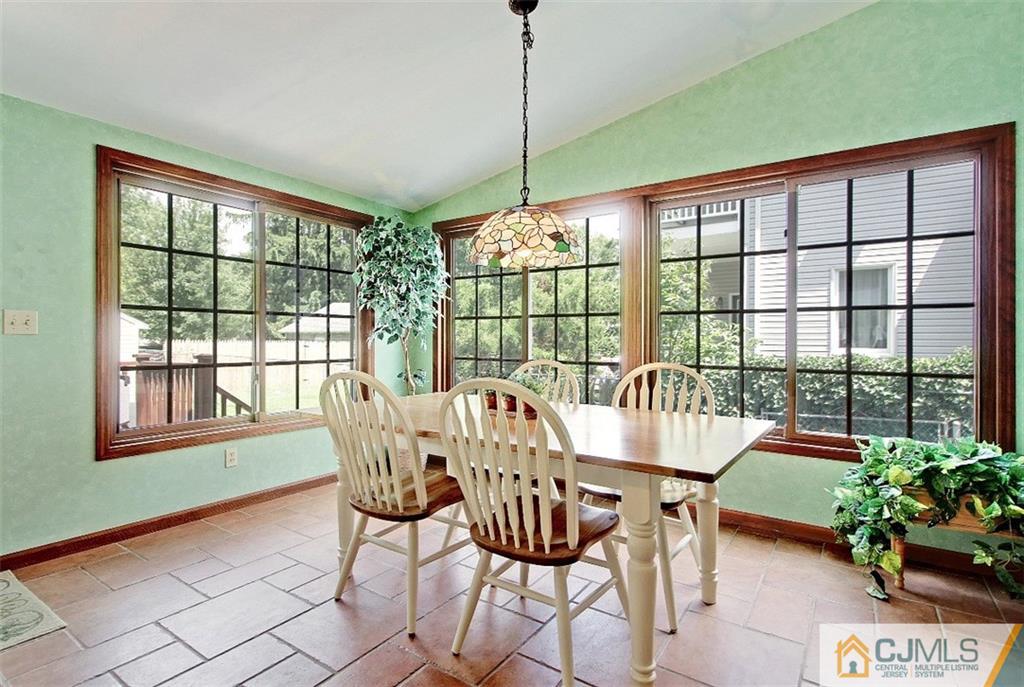 188 Stout Avenue Middlesex, NJ 08846 - Photo 5 of 25 a view of a dining room with furniture window and outside view