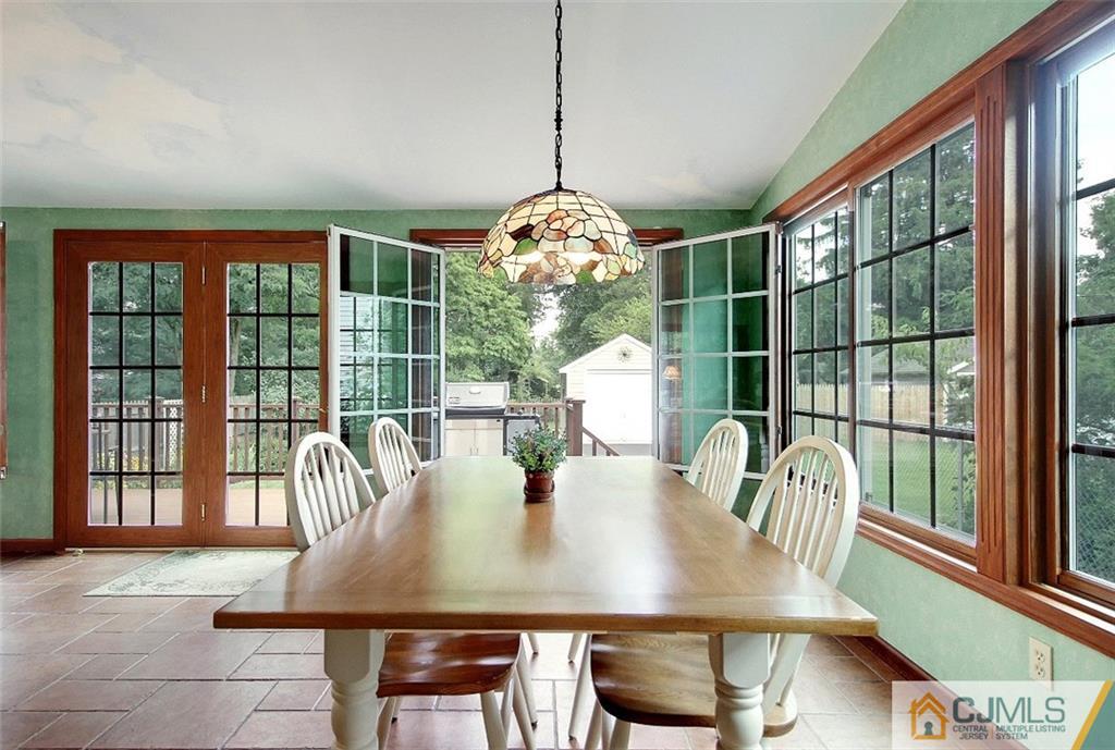 188 Stout Avenue Middlesex, NJ 08846 - Photo 6 of 25 a view of a dining room with furniture window and outside view