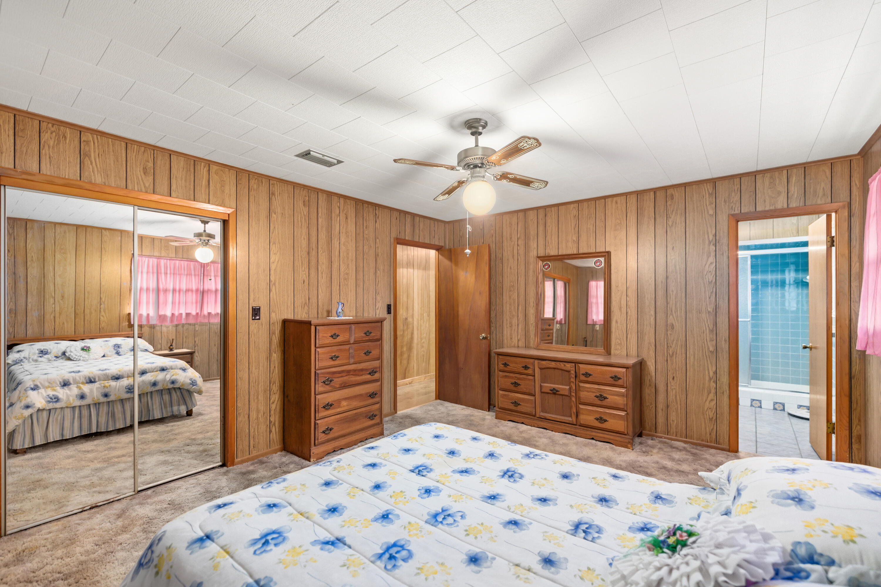 1287 Adams Road DeFuniak Springs, FL 32433 - Photo 33 of 67 a bedroom with a bed and a dresser