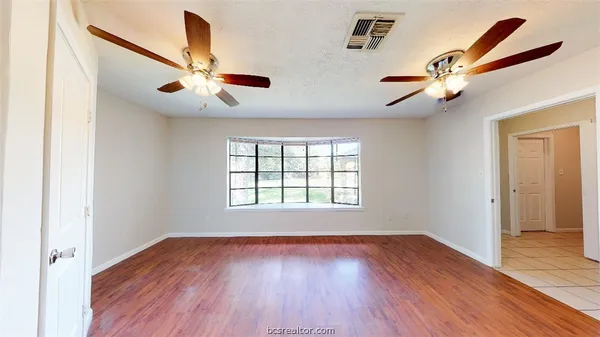 a view of empty room with a window