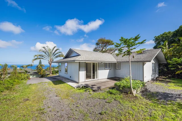 a view of a garden with an outdoor space