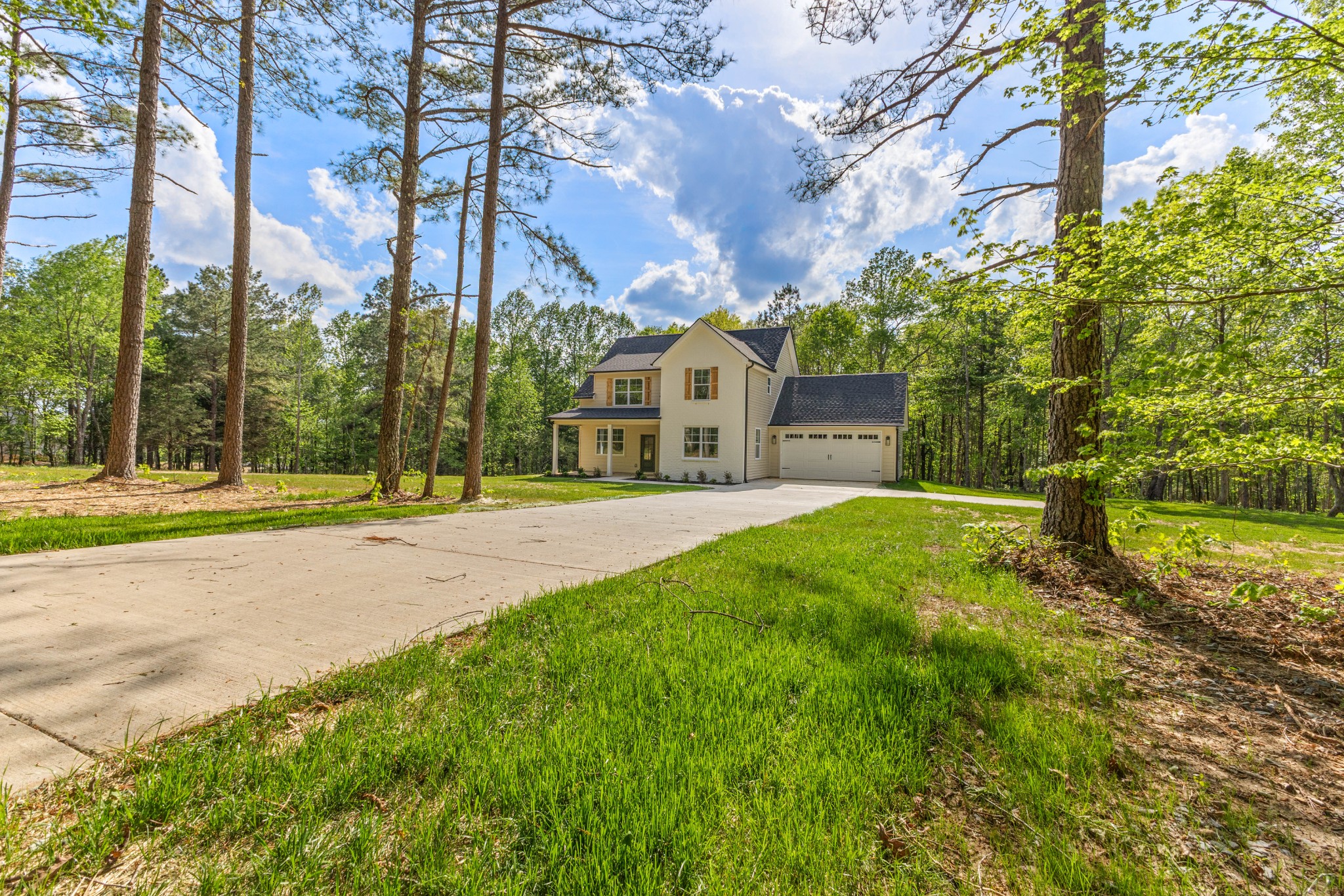 1013 Walnut Grove Road Dickson, TN 37055 - Photo 2 of 38 a view of a house with a yard