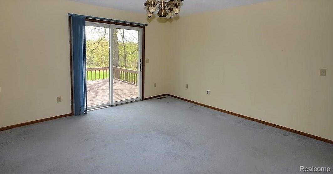 11365 Linden Road Linden, MI 48451 - Photo 12 of 22 DINING ROOM WALK OUT TO DECK