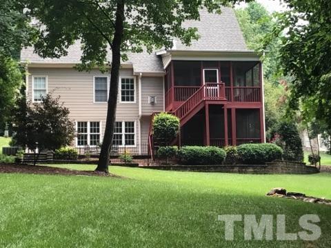 204 Okamato Street Raleigh, NC 27603 - Photo 1 of 25 a front view of a house with a yard