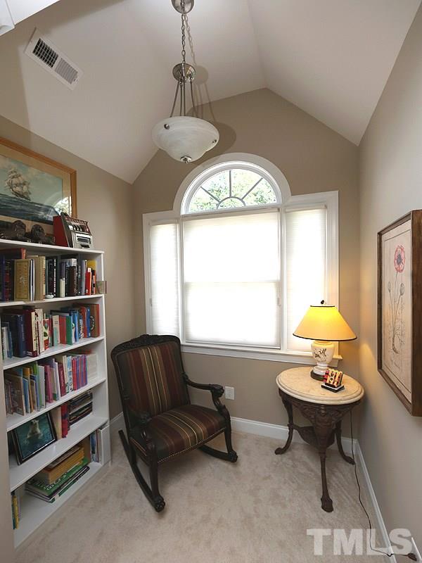 204 Okamato Street Raleigh, NC 27603 - Photo 14 of 25 a living room with furniture and a window
