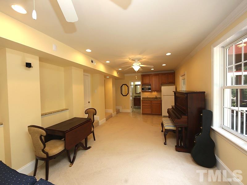 204 Okamato Street Raleigh, NC 27603 - Photo 18 of 25 a living room with furniture