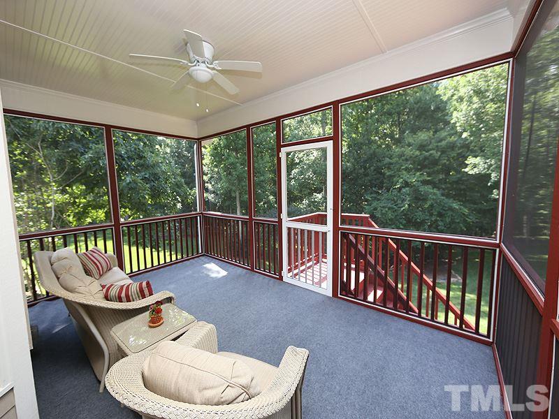204 Okamato Street Raleigh, NC 27603 - Photo 8 of 25 a balcony with furniture and wooden floor