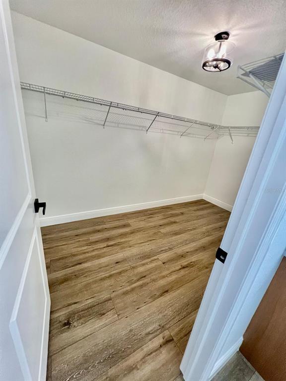 13322 Southwest 66th Street Ocala, FL 34481 - Photo 12 of 15 a view of a room with racks on the wall