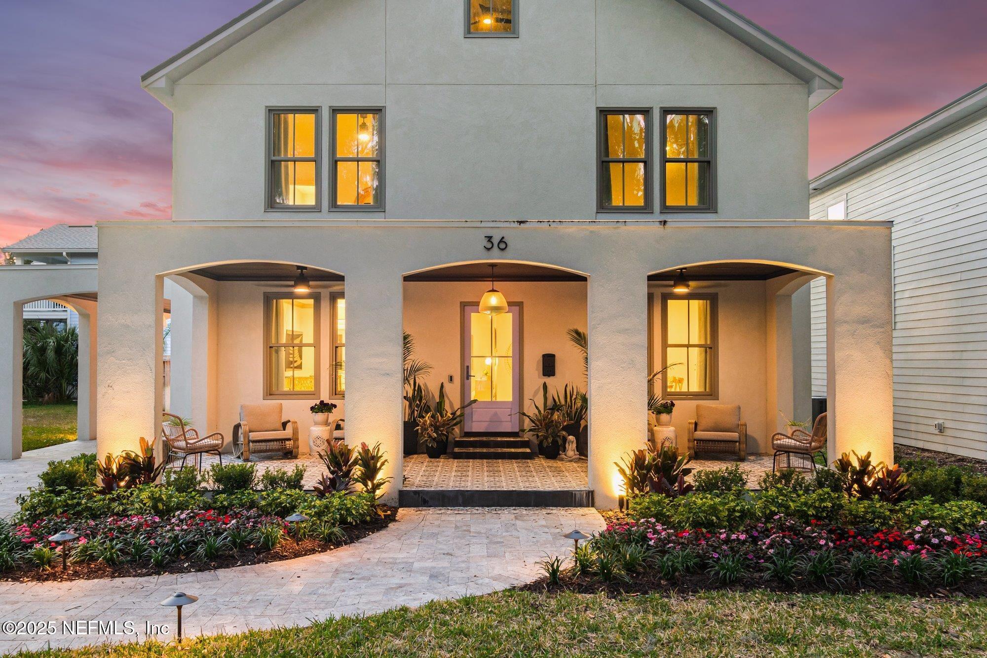 36 Magnolia Avenue St. Augustine, FL 32084 - Photo 1 of 45 a front view of a house with a yard