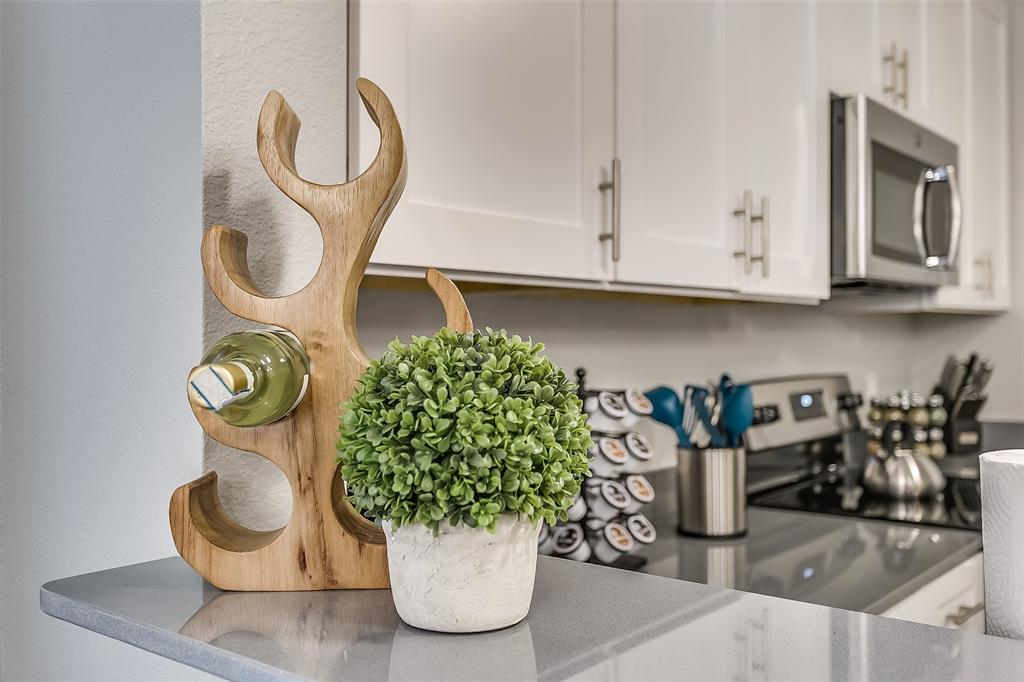 3816 Sheraton Road Denton, TX 76209 - Photo 11 of 40 a vase of flowers sitting on a table