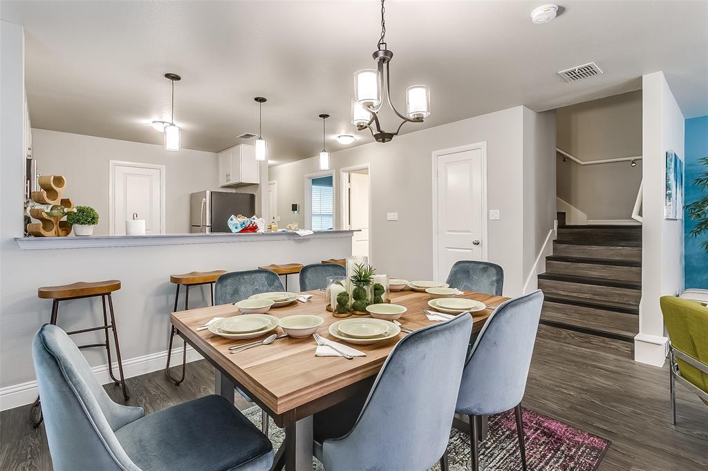 3816 Sheraton Road Denton, TX 76209 - Photo 15 of 40 a view of a dining room and livingroom with furniture