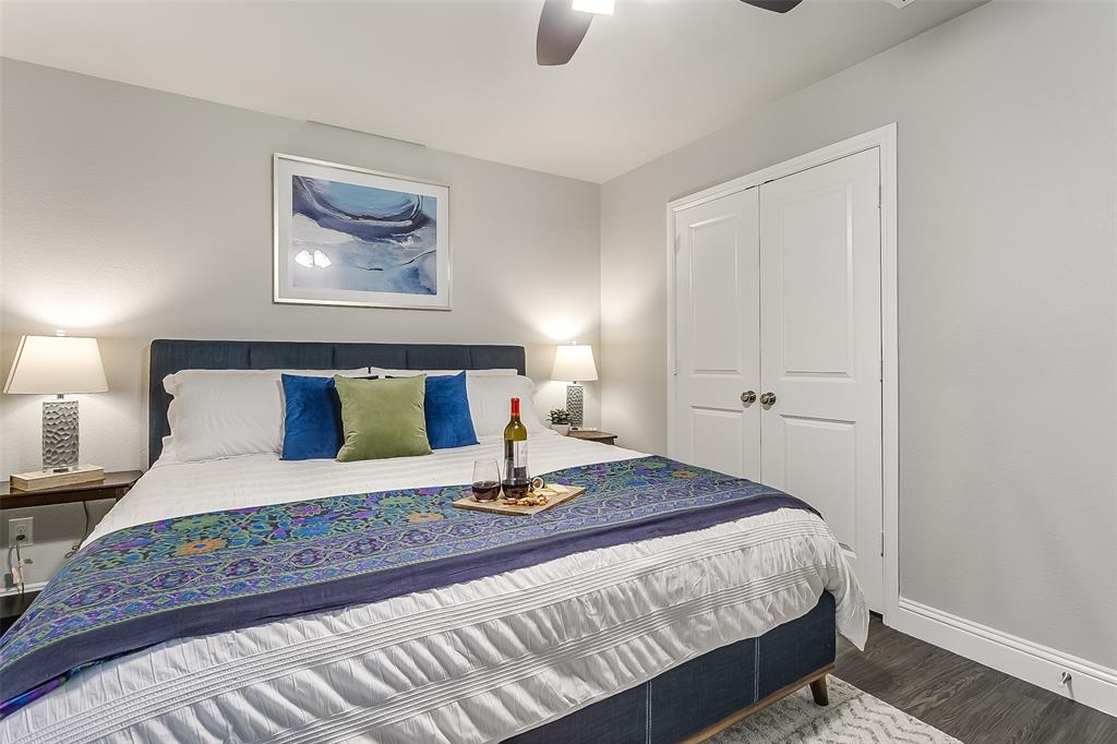 3816 Sheraton Road Denton, TX 76209 - Photo 38 of 40 a bedroom with a bed and painting on the wall