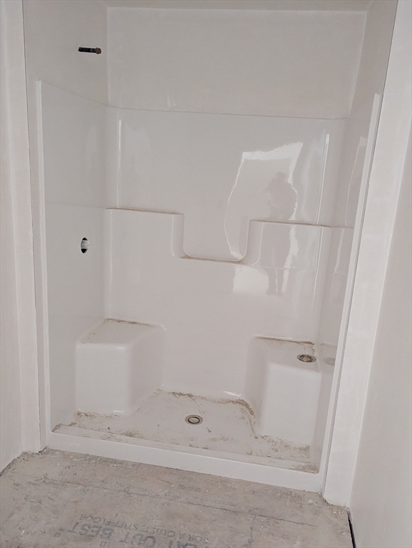 3 Delphi Way Londonderry, NH 03053 - Photo 20 of 20 a bathroom with a bathtub