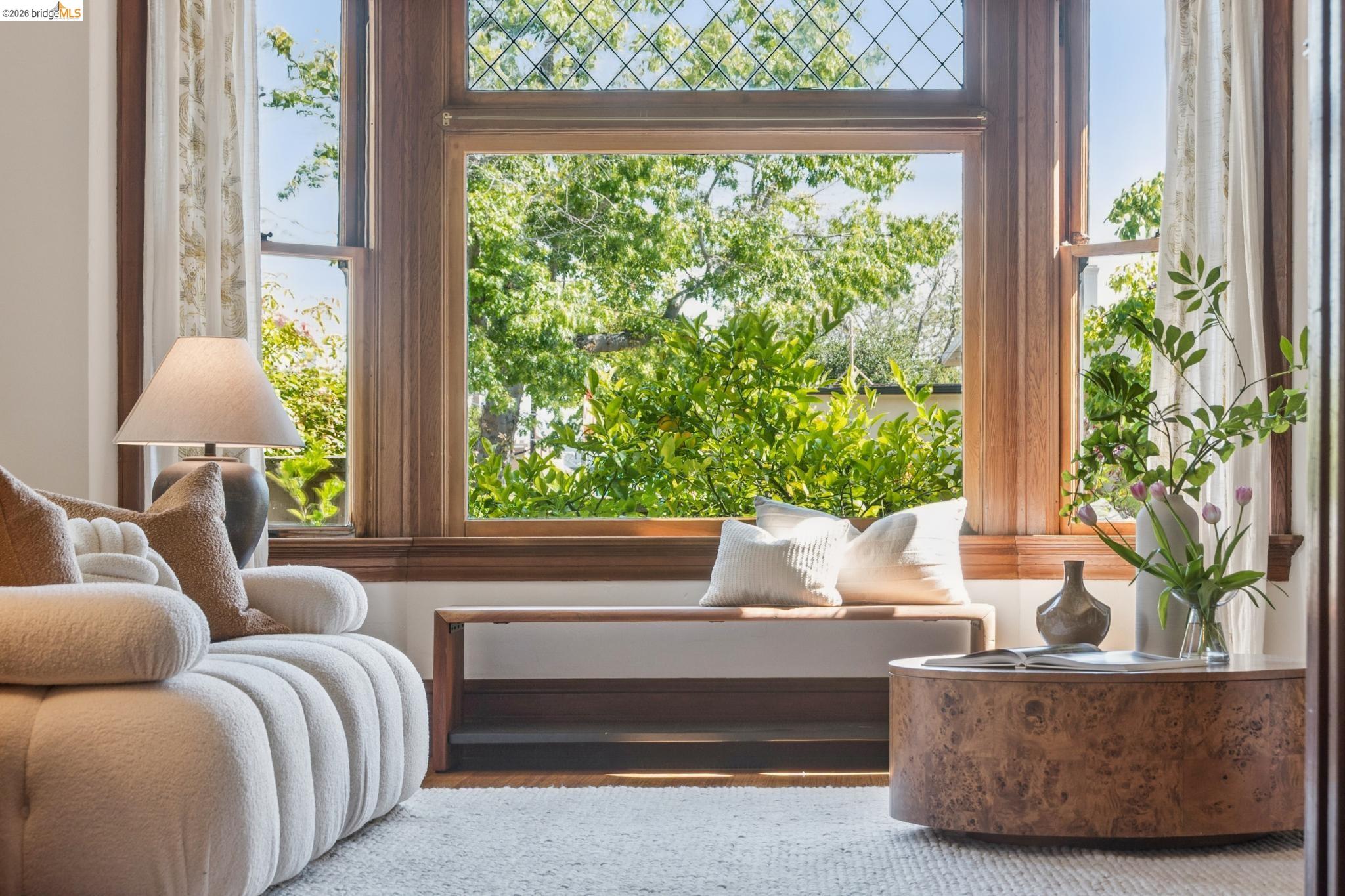 1490 Arch Street Berkeley, CA 94708 - Photo 9 of 57 a living room with furniture and a window