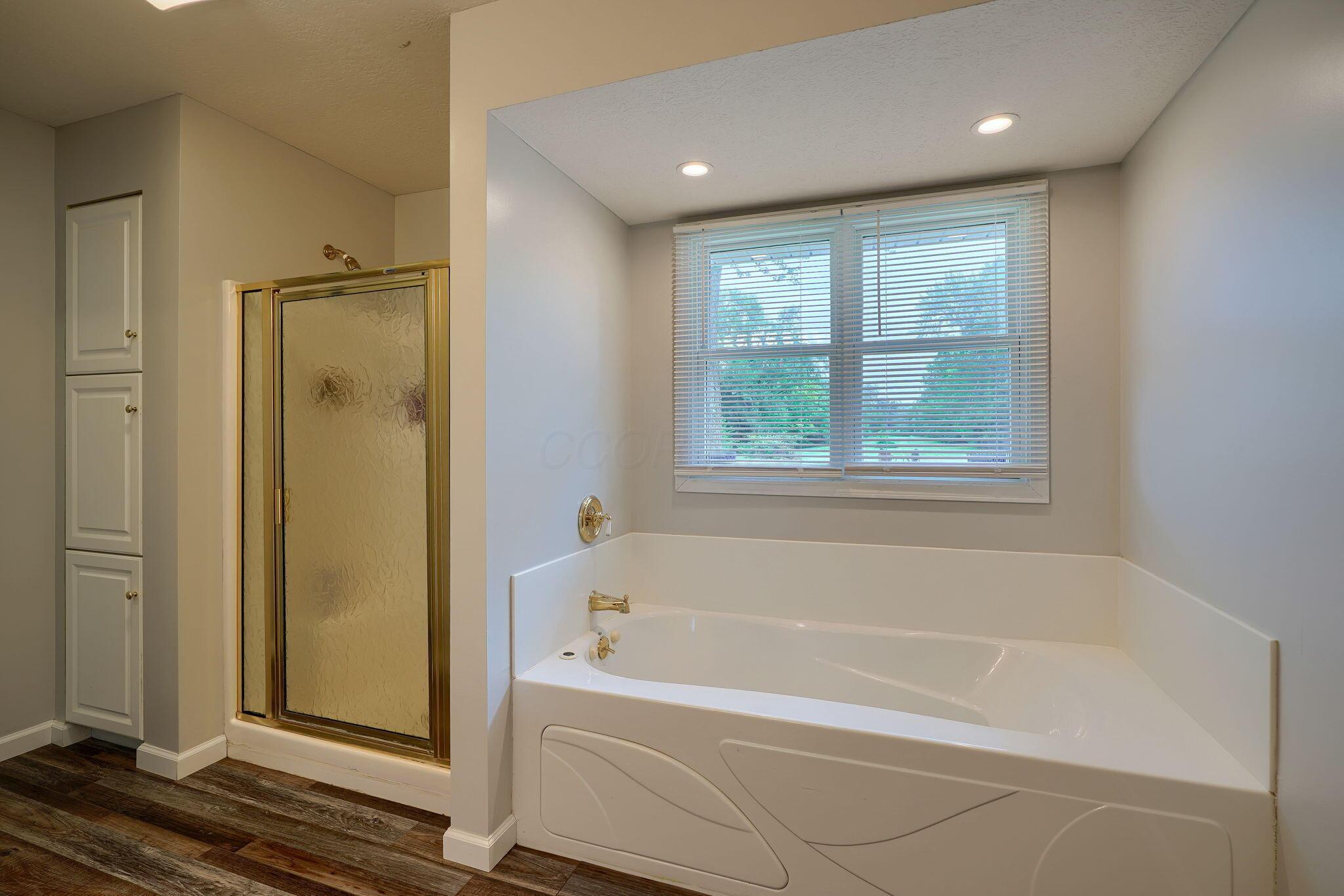 7474 Groveport Road Groveport, OH 43125 - Photo 42 of 70 Spacious primary bath with garden tub, shower and water closet