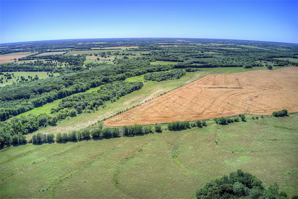 6399 Fm 2068 Commerce, TX 75428 - Photo 22 of 40 a view of a field with an ocean