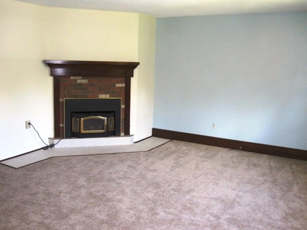 294 Southampton Road Westhampton, MA 01027 - Photo 9 of 26 a view of empty room with a fireplace