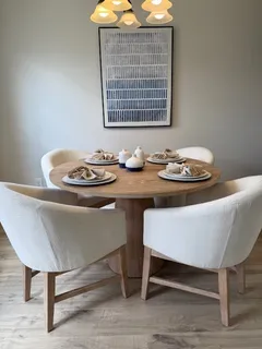 a room with granite countertop wall chair and cabinets