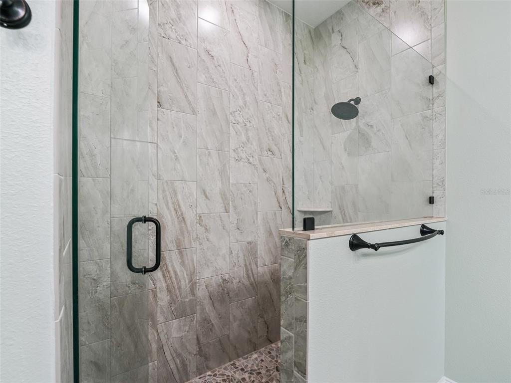 8567 Cr 635 Bushnell Bushnell, FL 33513 - Photo 24 of 46 a bathroom with a shower