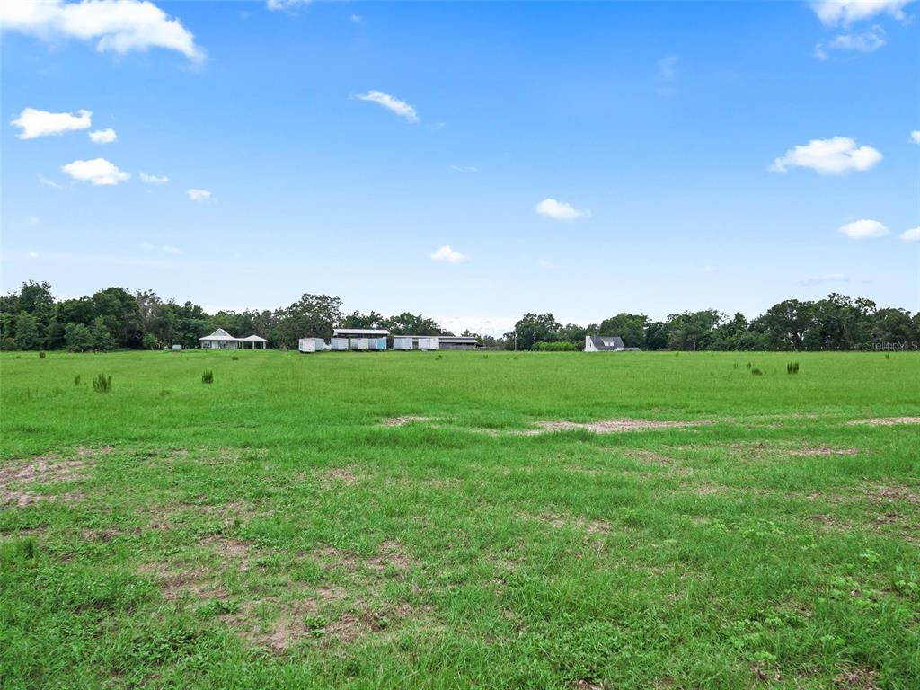 8567 Cr 635 Bushnell Bushnell, FL 33513 - Photo 38 of 46 a view of a green field with clear sky