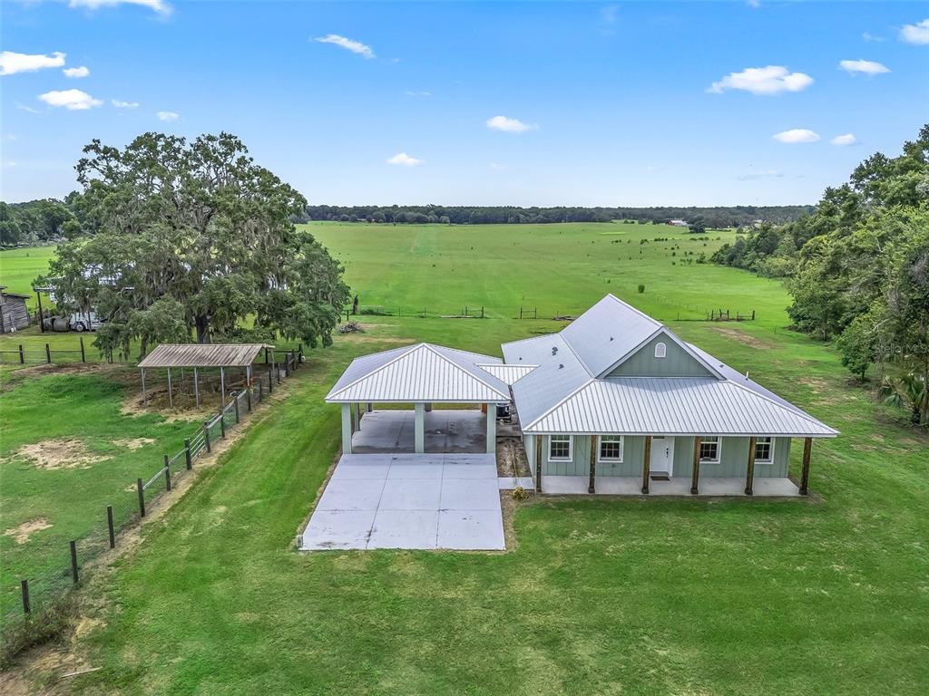 8567 Cr 635 Bushnell Bushnell, FL 33513 - Photo 45 of 46 a view of a house with a yard