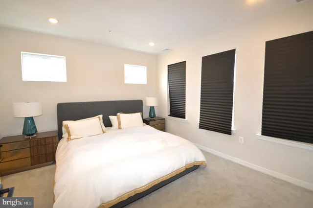 a large bedroom with bed