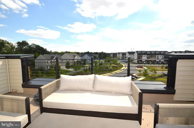 a view of a lake with couches