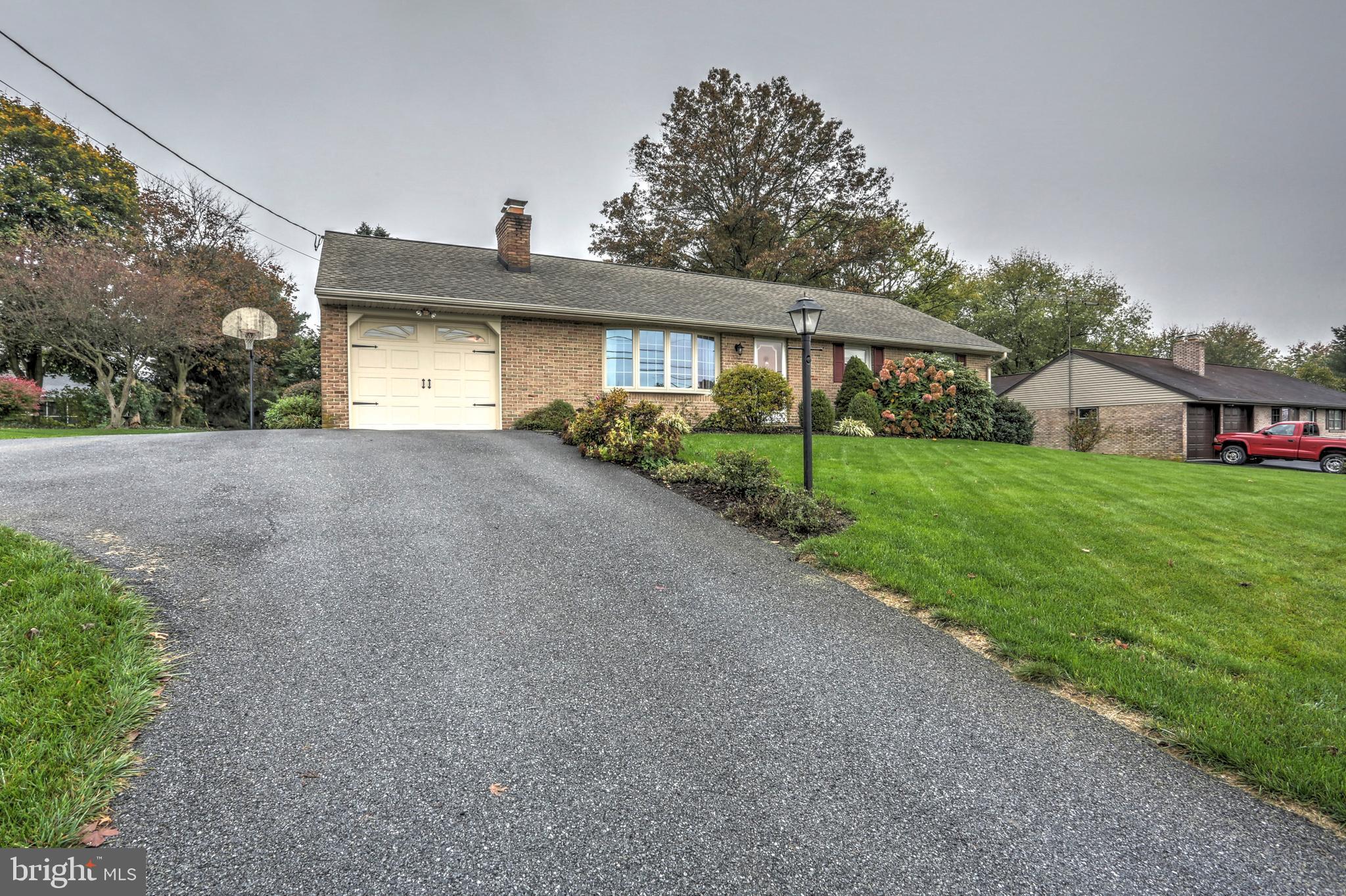 10 Snyder Hill Road Lititz, PA 17543 - Photo 3 of 38 Extra parking in the side extension driveway